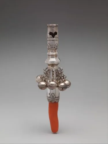 Teething coral with whistle and bells in silver.