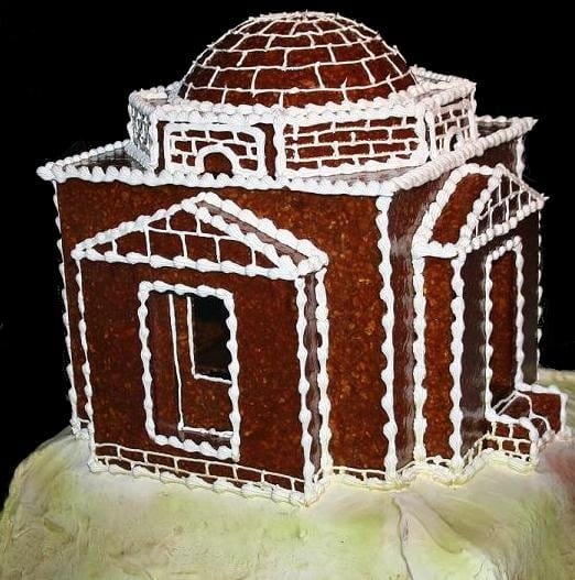 Gingerbread house decorated with royal icing.
