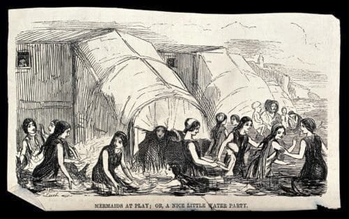 Women bathing in the sea near their bathing machines