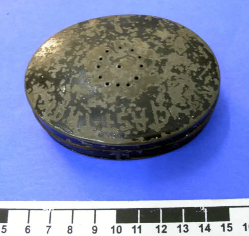 Tin pounce box; oval shaped, hinged and painted black
