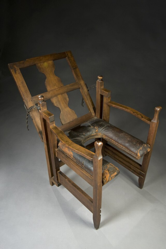 Folding, adjustable parturition chair, 18th-19th century. Chair in 'relaxed' position.
